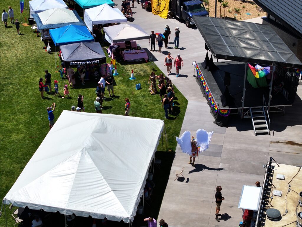 Aerial view during an event with tents and people walking
